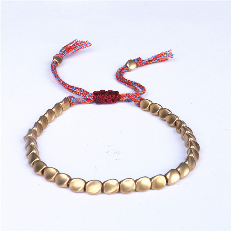 Subtle Zen Threads Bracelet: Mindful Gold & Woven Harmony