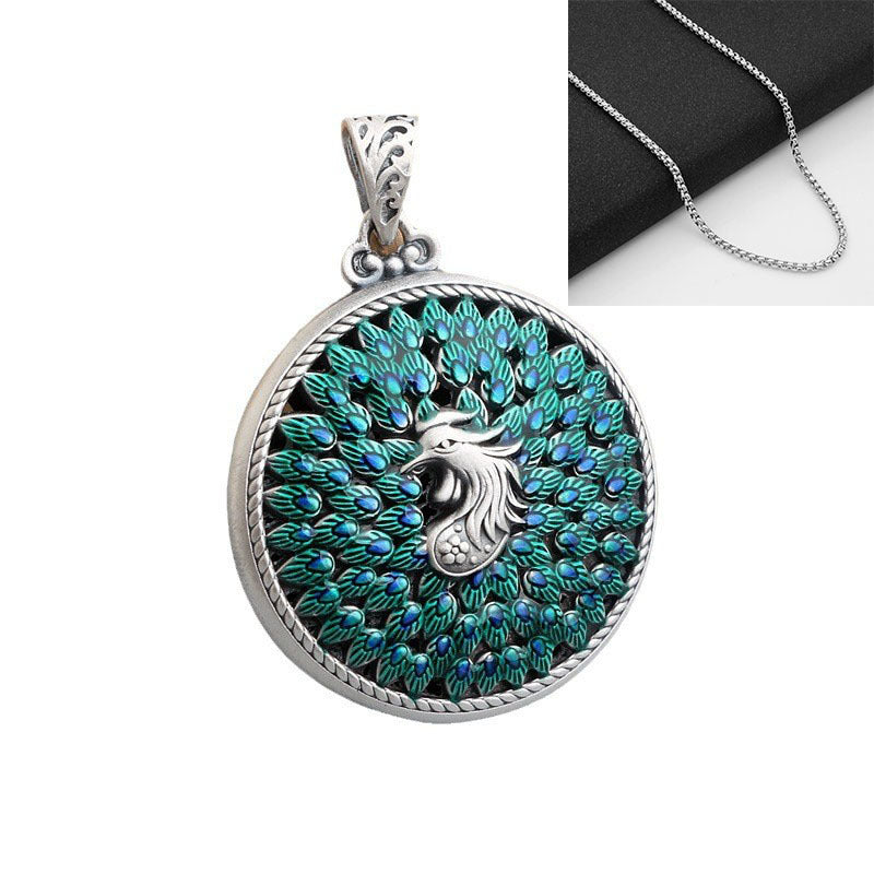 Hollow Carved Peacock Amulet – Elegance from Within | Zen Ara Grove