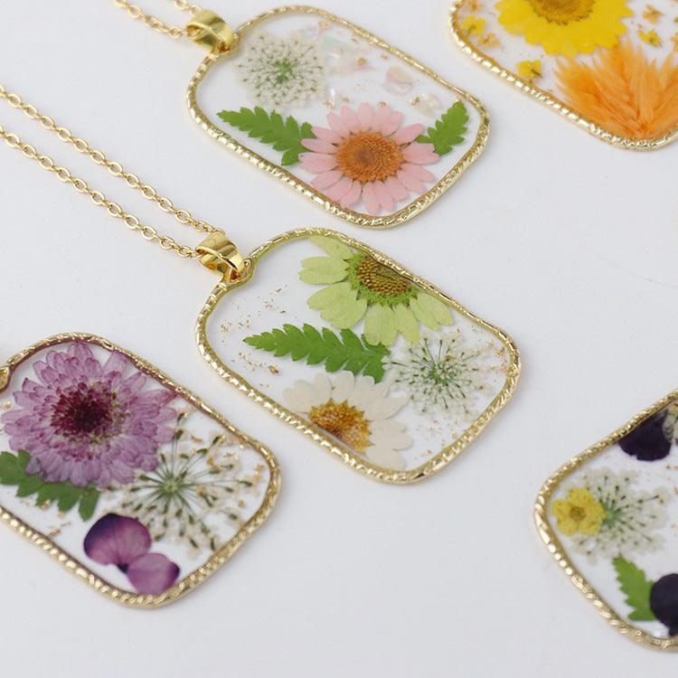 BloomCapsule™ Pressed Flora Resin Pendant Collection