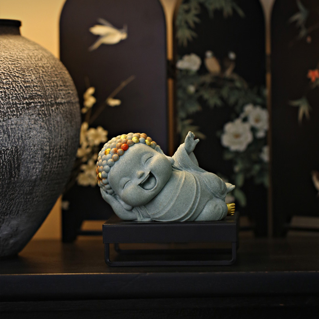 Lying Buddha Novice Statue – Essence of Contentment and Harmony | Zen Ara Grove