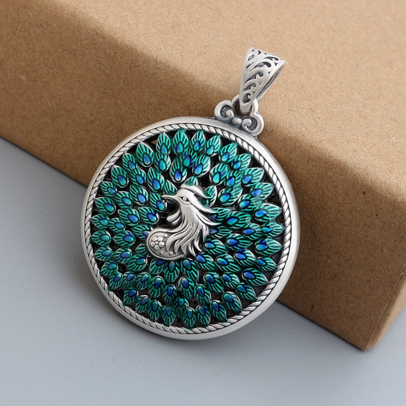 Hollow Carved Peacock Amulet – Elegance from Within | Zen Ara Grove