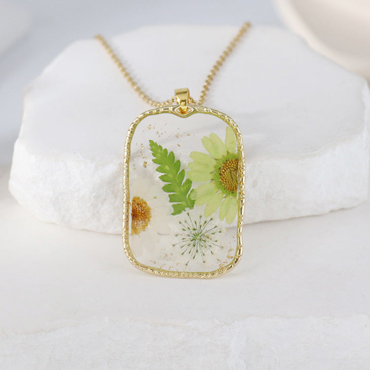 BloomCapsule™ Pressed Flora Resin Pendant Collection