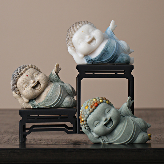 Lying Buddha Novice Statue – Essence of Contentment and Harmony | Zen Ara Grove