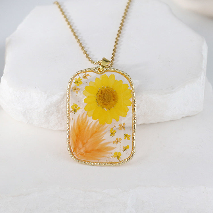 BloomCapsule™ Pressed Flora Resin Pendant Collection