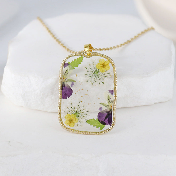 BloomCapsule™ Pressed Flora Resin Pendant Collection