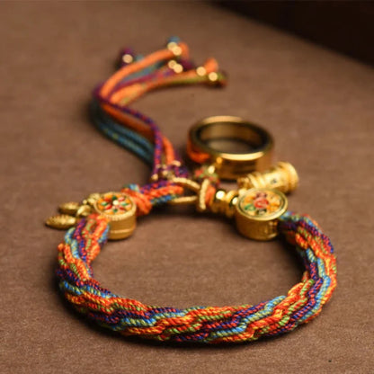 Spin Your Luck Bracelet: Handwoven Color Strings with Secret Charms