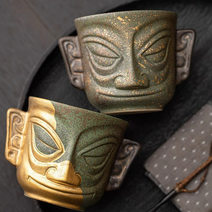 Sanxingdui Gold Mask Ceramic Teacup – Inspired Heritage Drinkware | Zen Ara Grove
