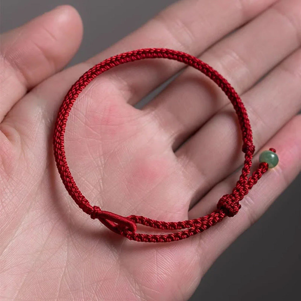 Adjustable Woven Cord Bracelet with Green Accent Bead — Hope & Good Wishes