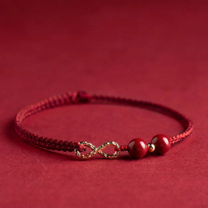 Adjustable Infinity Cord Bracelet with Cinnabar Beads
