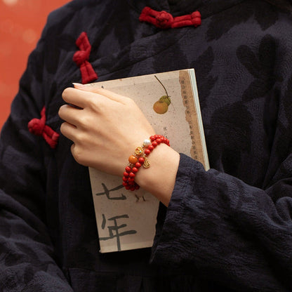 Double-Layer Cinnabar Mala · Golden Heart Inlay