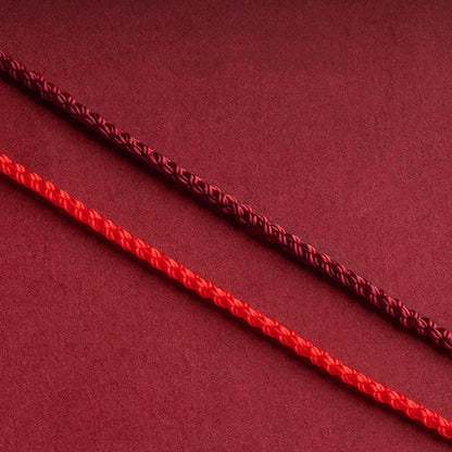 Adjustable Infinity Cord Bracelet with Cinnabar Beads