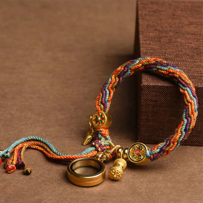 Spin Your Luck Bracelet: Handwoven Color Strings with Secret Charms