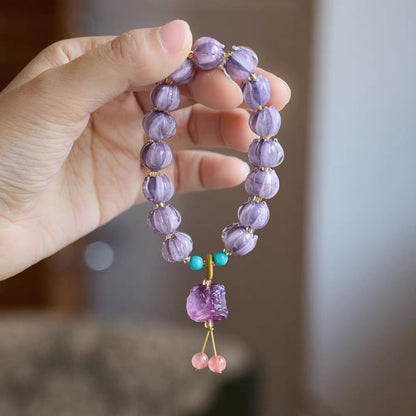 Purple Lotus Glass Bracelet with Awakening Lion Charm | Zen Ara Grove