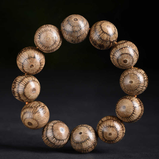 Rattan Eagle-Eye Wood Mala Bracelet