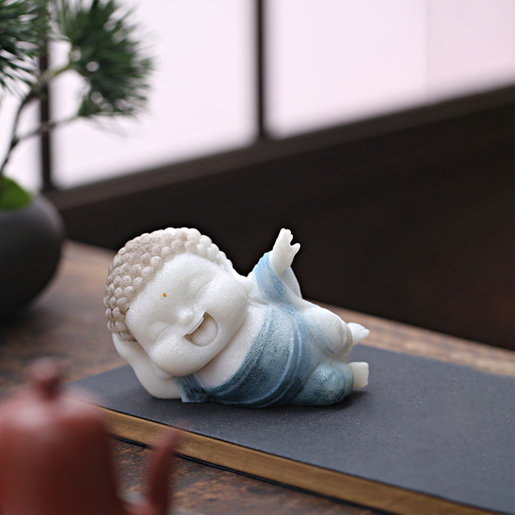 Lying Buddha Novice Statue – Essence of Contentment and Harmony | Zen Ara Grove