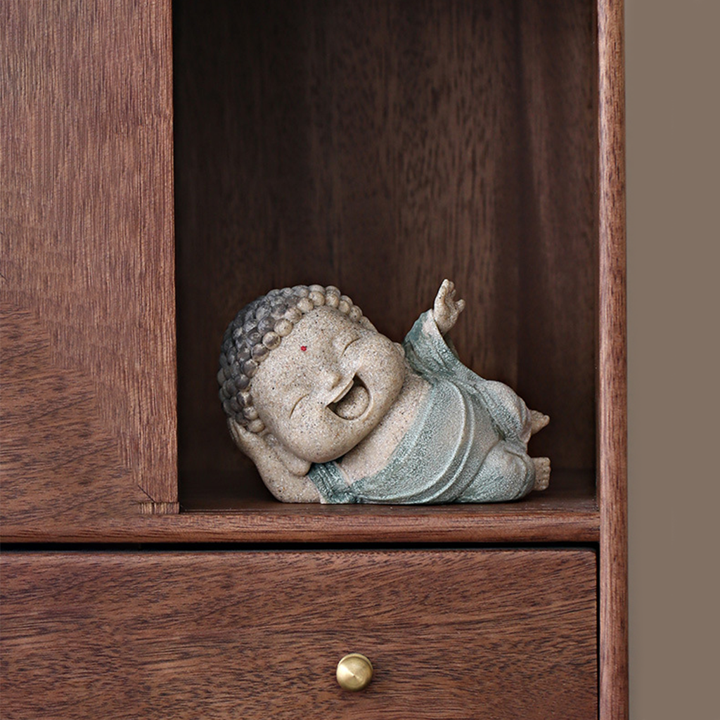 Lying Buddha Novice Statue – Essence of Contentment and Harmony | Zen Ara Grove