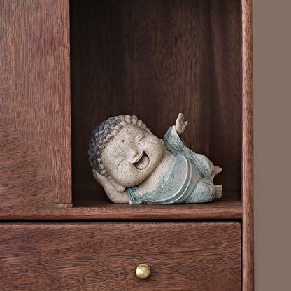 Lying Buddha Novice Statue – Essence of Contentment and Harmony | Zen Ara Grove