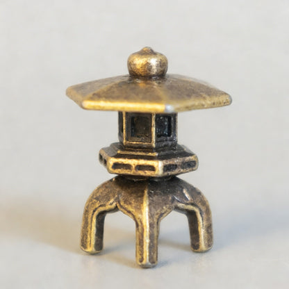 Mini Brass Stone Lantern Figurine – Symbol of Illumination and Tranquility | Zen Ara Grove