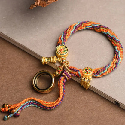 Spin Your Luck Bracelet: Handwoven Color Strings with Secret Charms