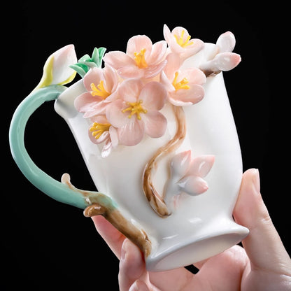 Handcrafted Ceramic Cup with Soft Pink Cherry Blossom – Blooming from the Cup, One of a Kind | Zen Ara Grove