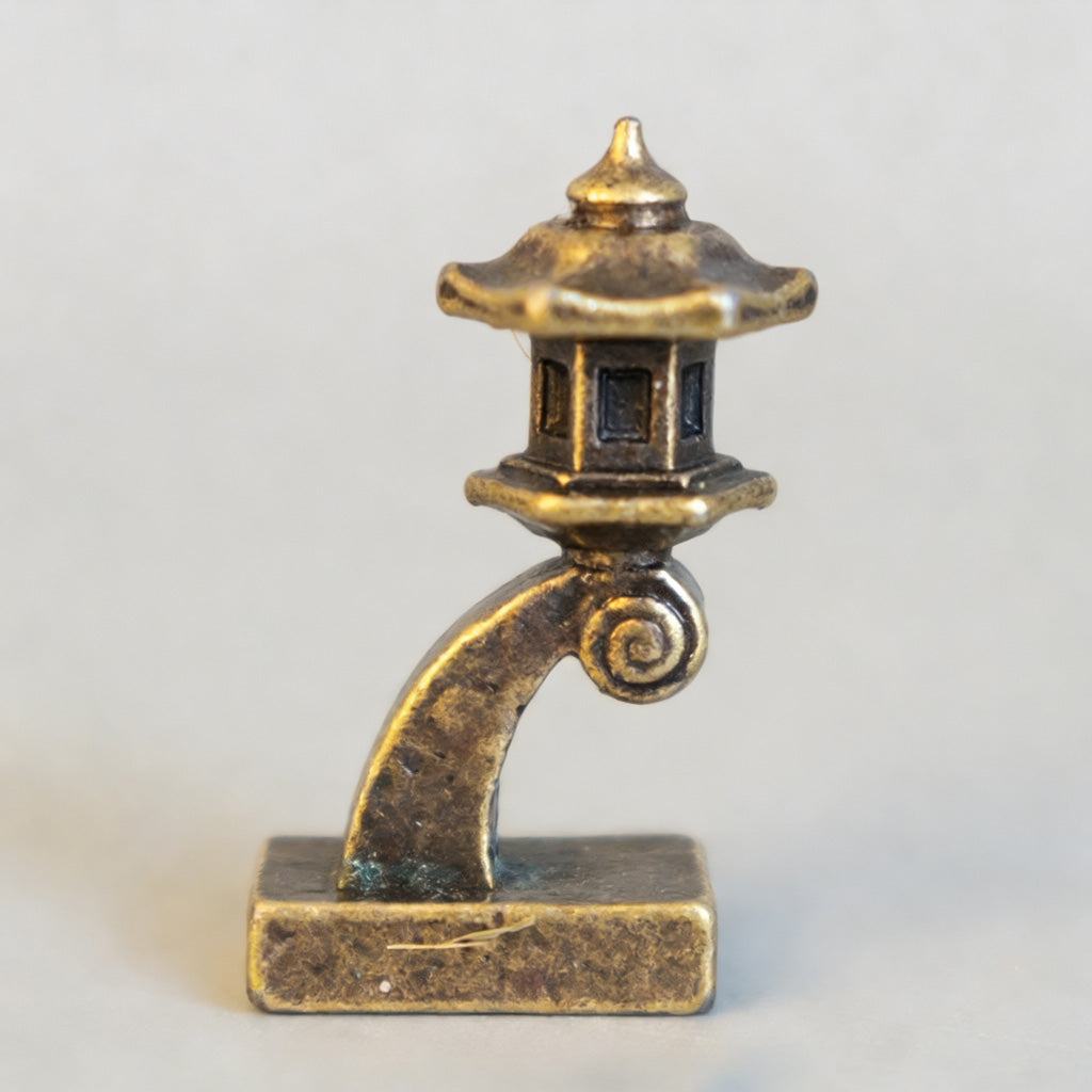 Mini Brass Stone Lantern Figurine – Symbol of Illumination and Tranquility | Zen Ara Grove