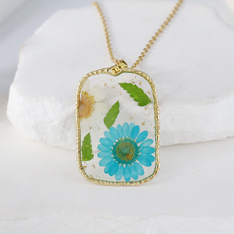 BloomCapsule™ Pressed Flora Resin Pendant Collection
