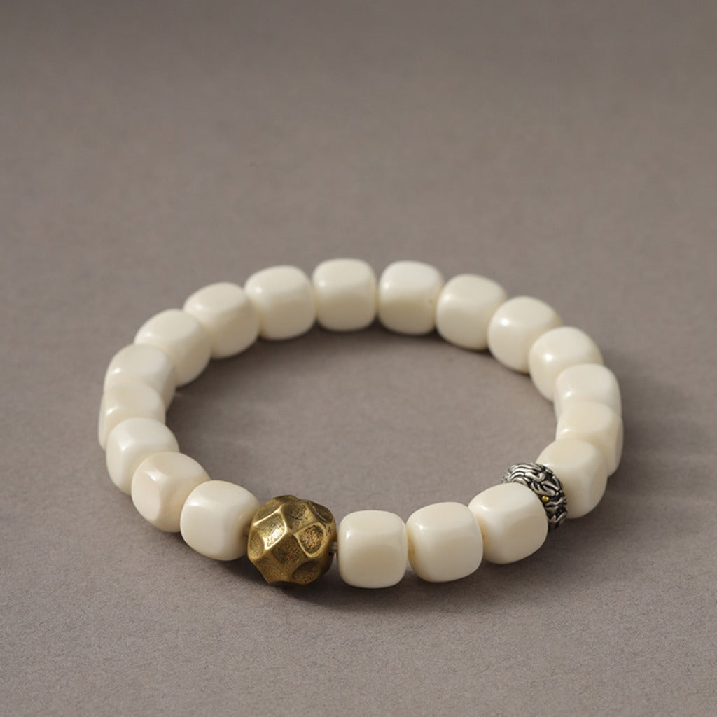 White Bodhi Seed Talisman | Hammered Birth-Buddha Amulet | Zen Ara Grove