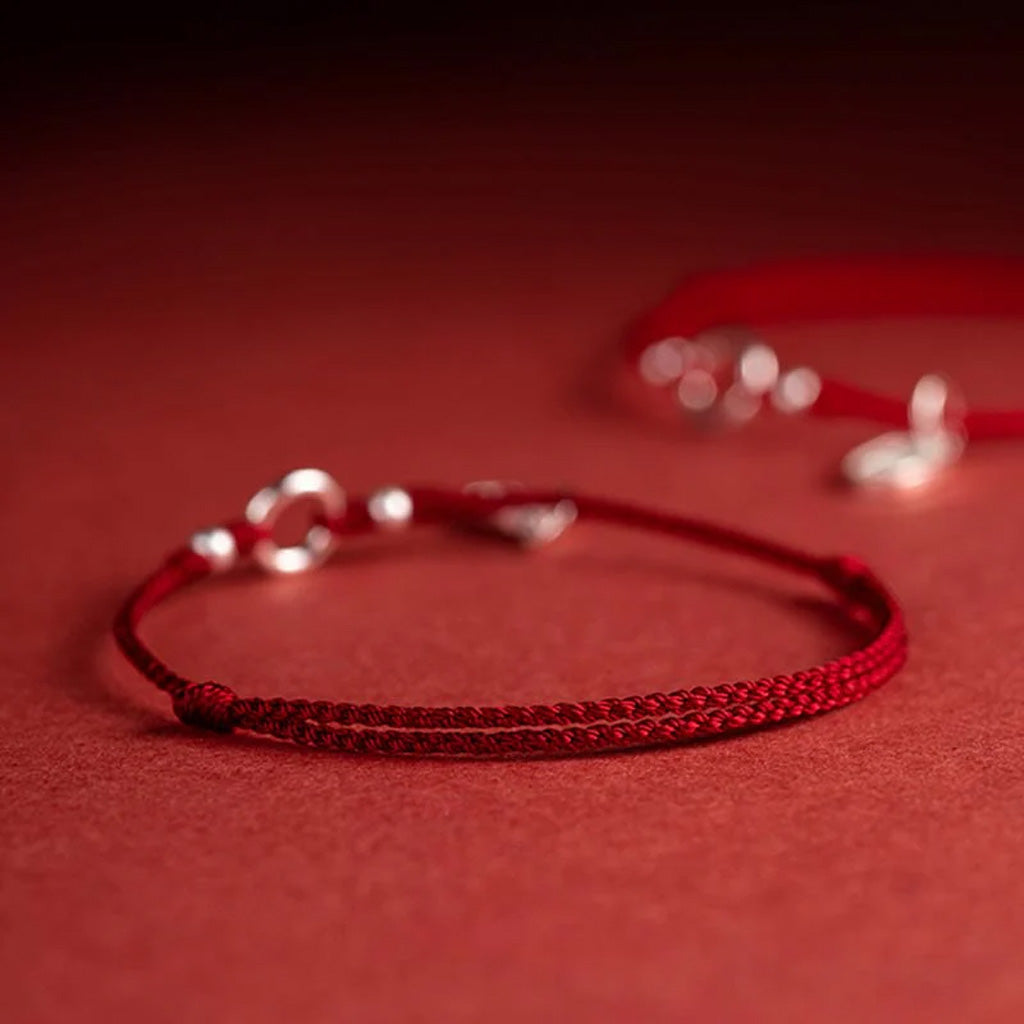 Adjustable Red Cord Bracelet or Anklet with Symbolic Charms — Good Wishes