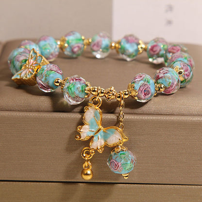 Blue Rose Garden Butterfly Pendant Glass Bracelet | Zen Ara Grove