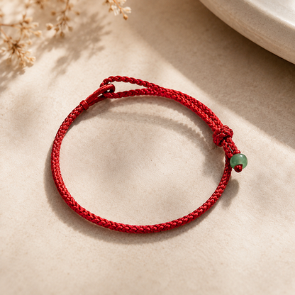 Adjustable Woven Cord Bracelet with Green Accent Bead — Hope & Good Wishes