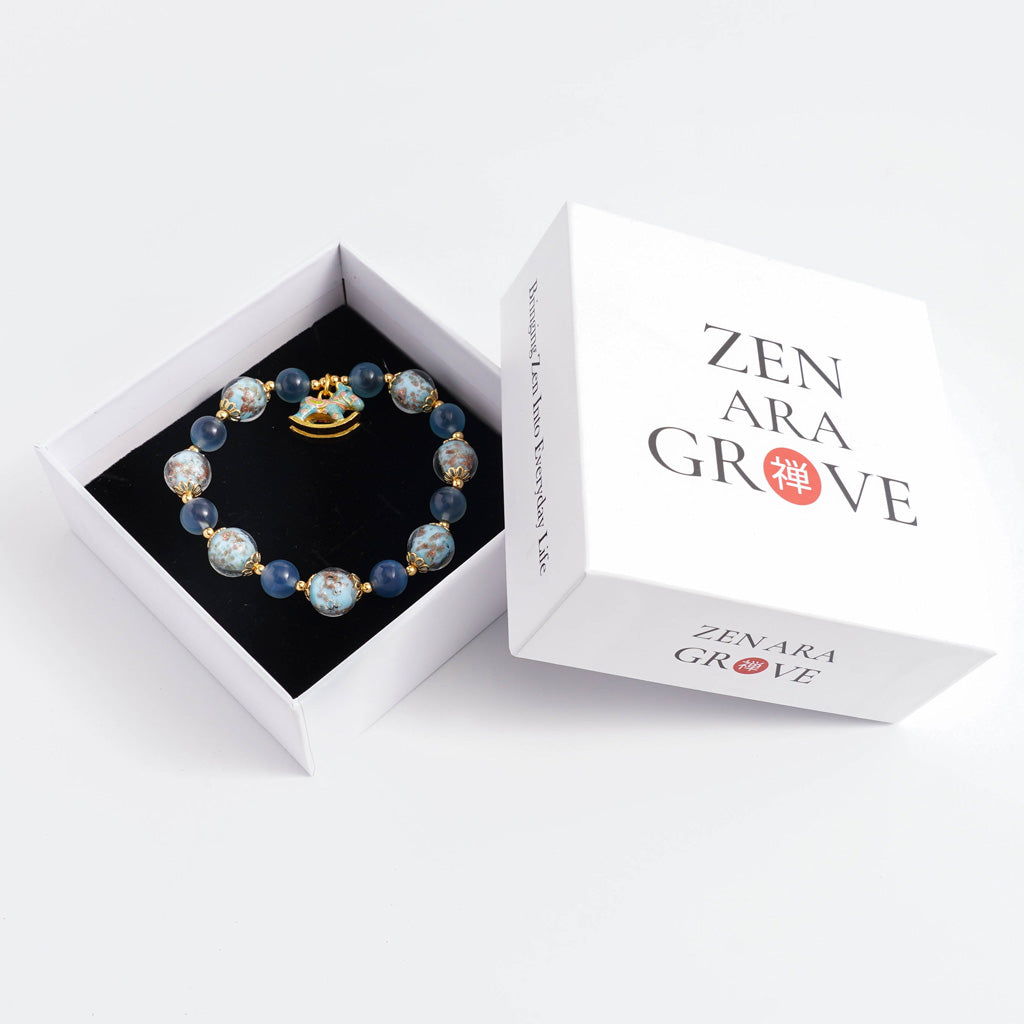 LIMITED TIME OFFER-Handcrafted Blue Agate and Luminous Glass Bead Bracelet –  A Symbol of Joy and Protection | Zen Ara Grove