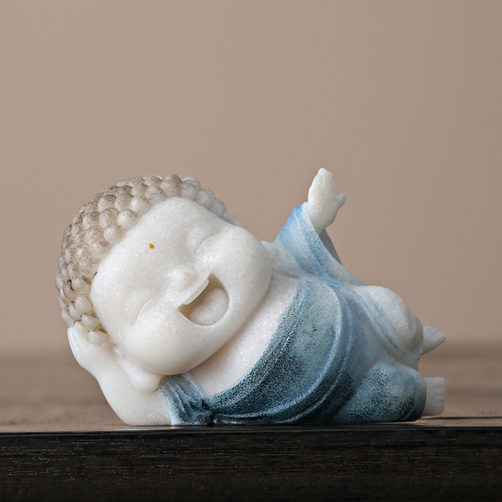Lying Buddha Novice Statue – Essence of Contentment and Harmony | Zen Ara Grove