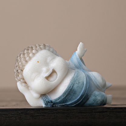 Lying Buddha Novice Statue – Essence of Contentment and Harmony | Zen Ara Grove