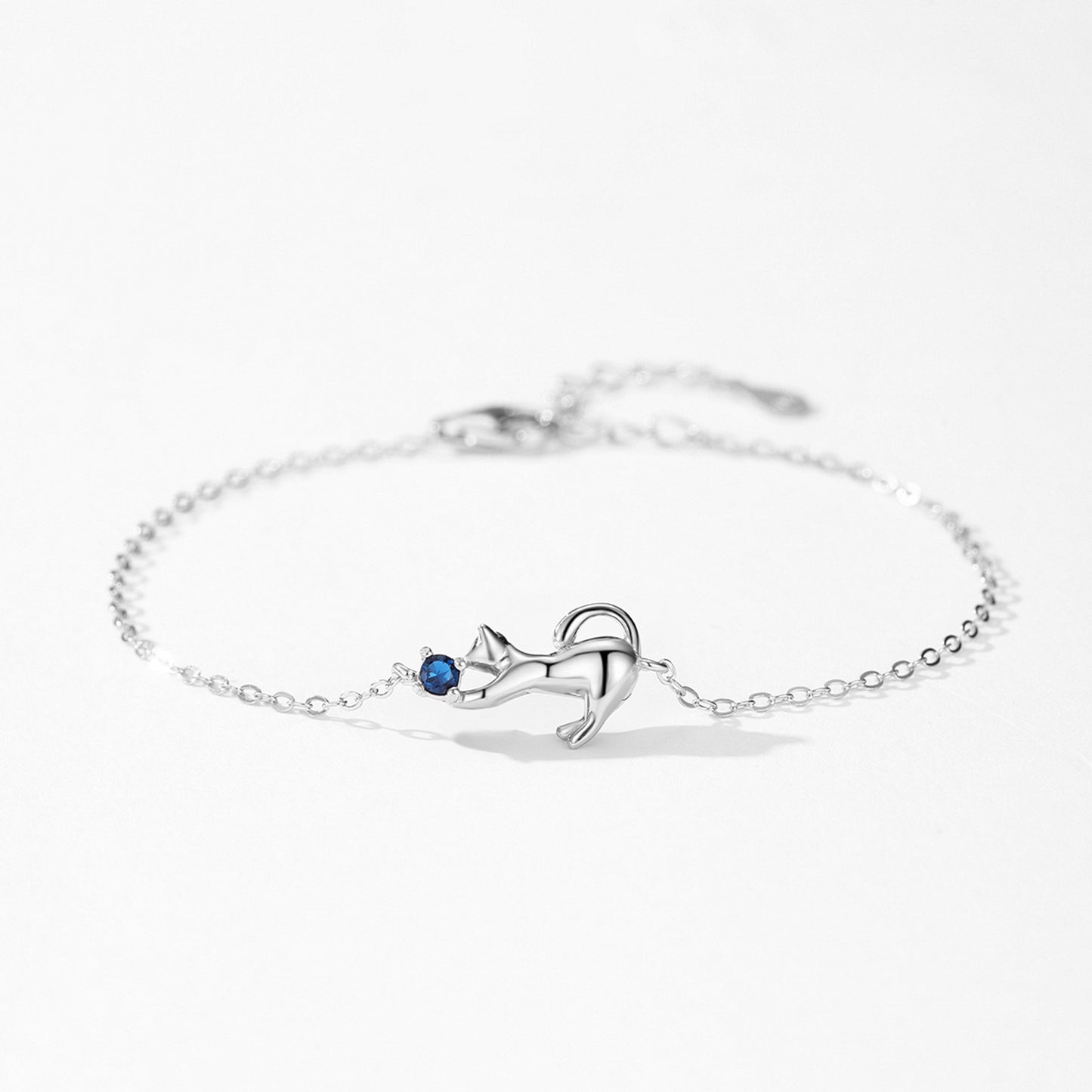 Sterling Silver Cat Bracelet – S925 Kitty Clutching Blue Cubic Zirconia | Zen Ara Grove