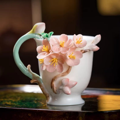 Handcrafted Ceramic Cup with Soft Pink Cherry Blossom – Blooming from the Cup, One of a Kind | Zen Ara Grove