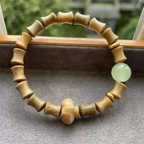 Bamboo Rhythm Cuff: Light-Shifting Wood & Gold Accents