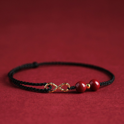 Adjustable Infinity Cord Bracelet with Cinnabar Beads