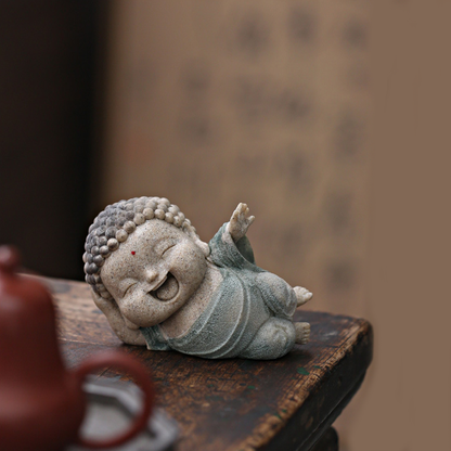 Lying Buddha Novice Statue – Essence of Contentment and Harmony | Zen Ara Grove