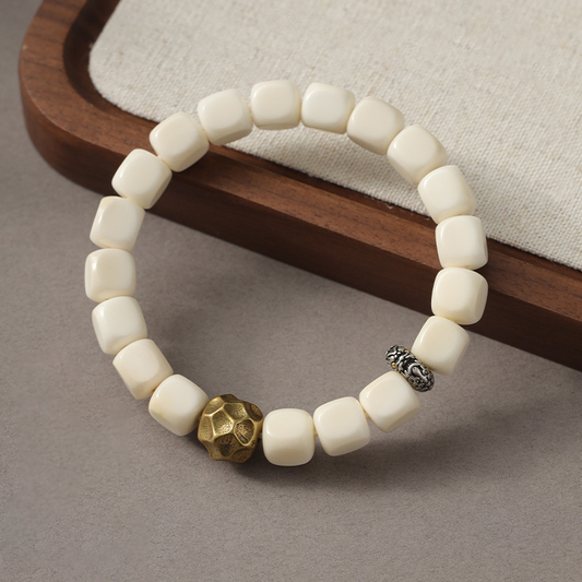 White Bodhi Seed Talisman | Hammered Birth-Buddha Amulet | Zen Ara Grove