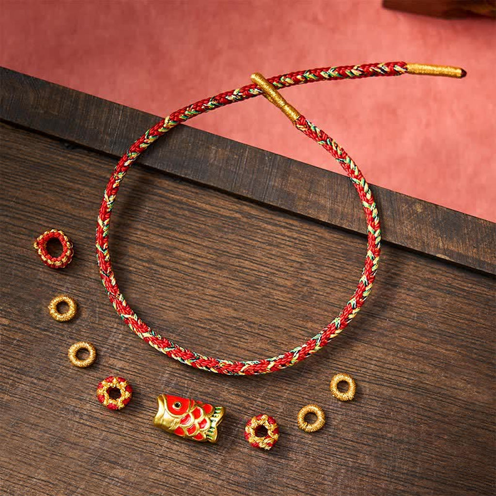 Adjustable Hand-Braided Koi Bracelet with Gold-Tone Details — Perseverance & Good Fortune