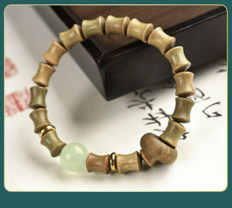 Bamboo Rhythm Cuff: Light-Shifting Wood & Gold Accents
