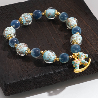 LIMITED TIME OFFER-Handcrafted Blue Agate and Luminous Glass Bead Bracelet –  A Symbol of Joy and Protection | Zen Ara Grove
