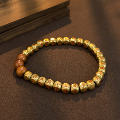 Golden Light Mantra Bracelet – Daoist Red Cinnabar Script Beads | Zen Ara Grove