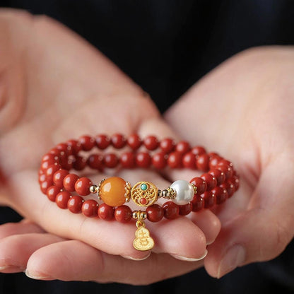 Double-Layer Cinnabar Mala · Golden Heart Inlay