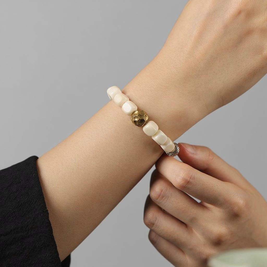 White Bodhi Seed Talisman | Hammered Birth-Buddha Amulet | Zen Ara Grove