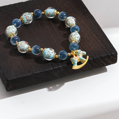 LIMITED TIME OFFER-Handcrafted Blue Agate and Luminous Glass Bead Bracelet –  A Symbol of Joy and Protection | Zen Ara Grove