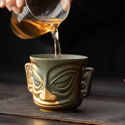 Sanxingdui Gold Mask Ceramic Teacup – Inspired Heritage Drinkware | Zen Ara Grove