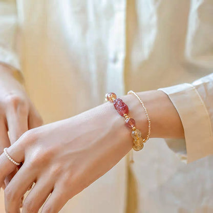 Hand‑Carved Strawberry Quartz Pixiu with Citrine Beads — Meaning of Wealth & Positive Flow | Zen Ara Grove