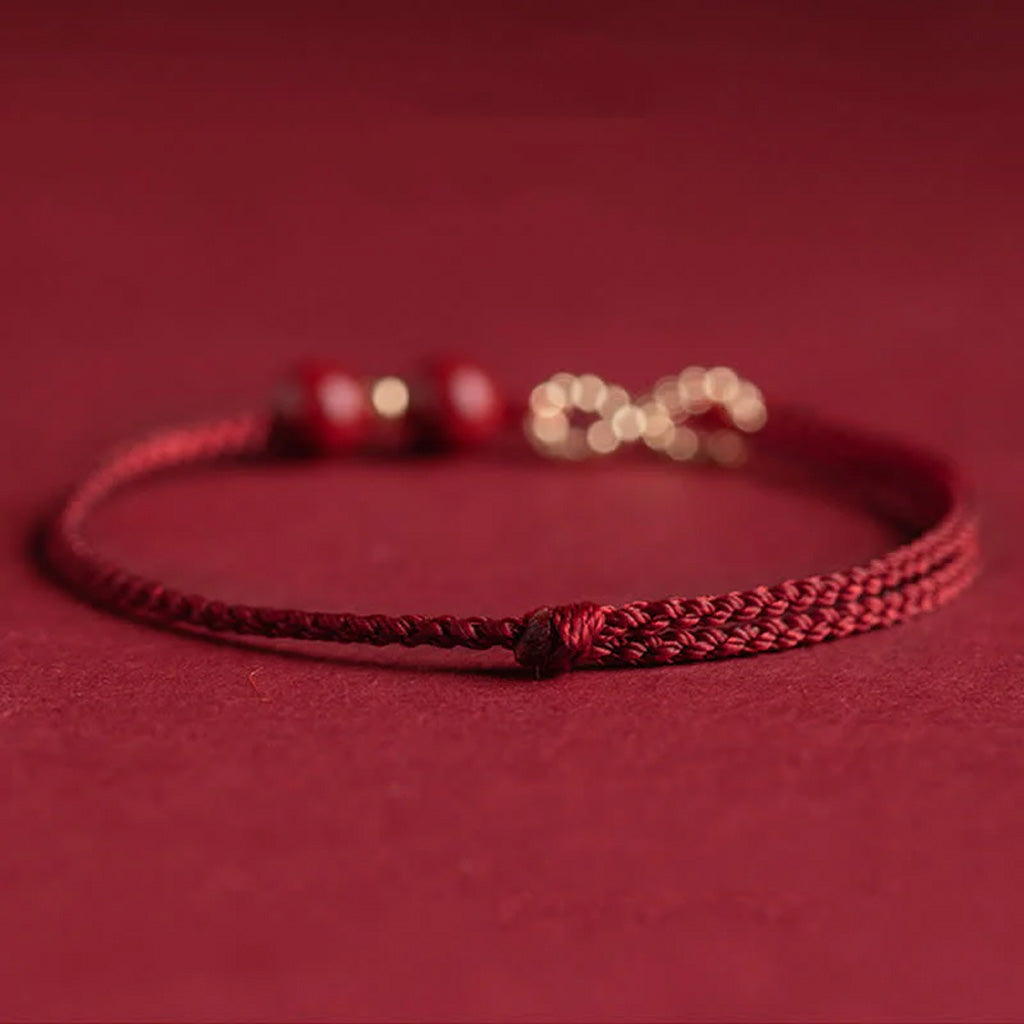 Adjustable Infinity Cord Bracelet with Cinnabar Beads