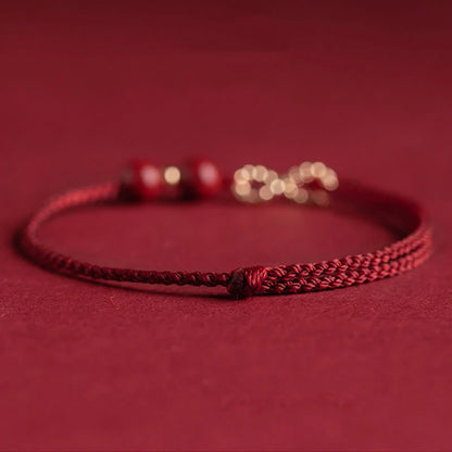 Adjustable Infinity Cord Bracelet with Cinnabar Beads